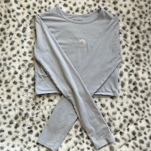 A light blue crop top with long sleeves from Hollister size medium.